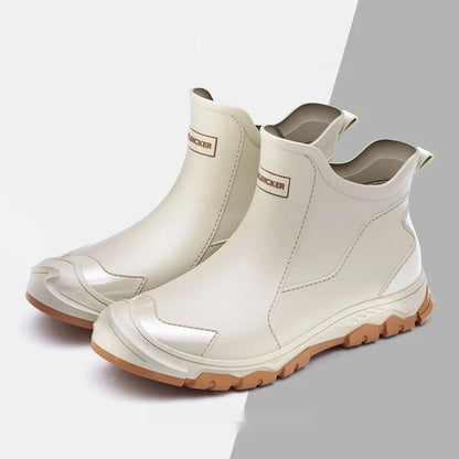 Men's short PVC rubber boots in beige, black, and black-red colours with a non-slip flat sole.