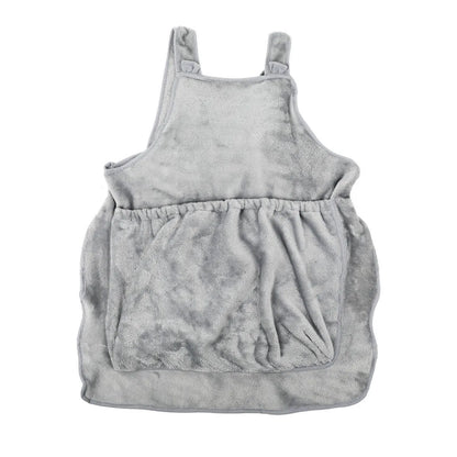 Beige plush pet carrier apron with adjustable neck strap and fresh air opening for small cat or dog