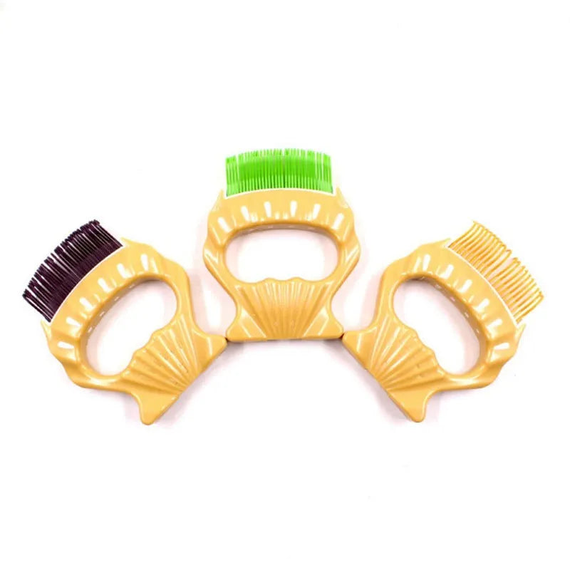 Green shell shaped pet grooming comb with bent wire bristles for removing loose hairs from dogs and cats
