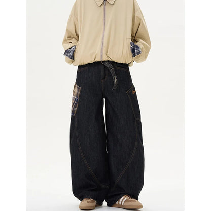 Loose straight-leg cotton trousers in a red plaid pattern, laid flat.