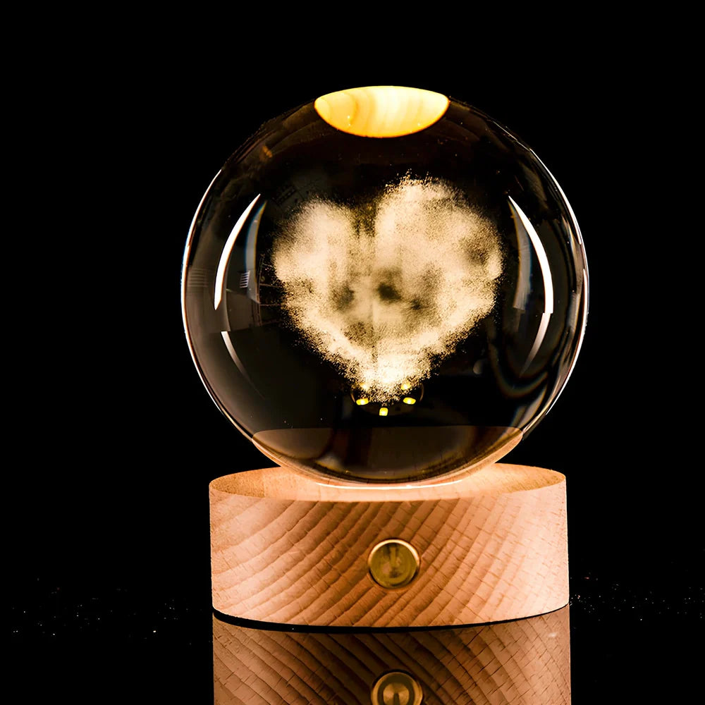 Luminous Galaxy Crystal Ball with 3D laser inner carving showing celestial patterns and gradient lighting