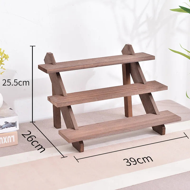 Multi-layer wooden stepped shelf in natural wood or walnut colour, shown in 2 to 5 tier floor-standing versions