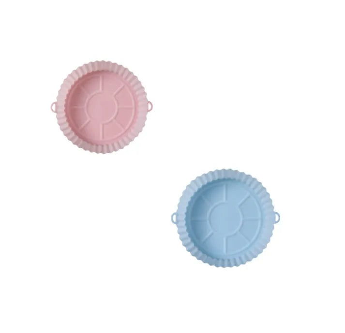 Round blue silicone baking tray mat with 4.5cm sides on a kitchen counter.