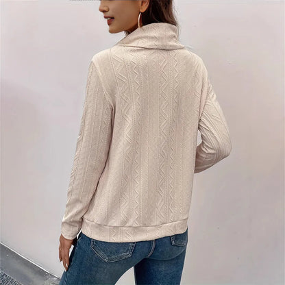 Apricot coloured women's hooded pullover sweater with drawstring and long sleeves