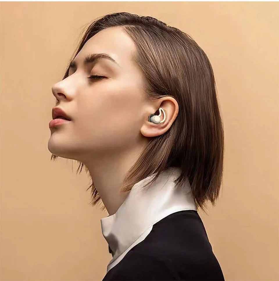 Soft, flexible silicone earplugs in grey and black colours, designed to block out disruptive sounds for a peaceful night's sleep