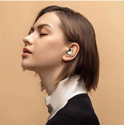 Soft, flexible silicone earplugs in grey and black colours, designed to block out disruptive sounds for a peaceful night's sleep