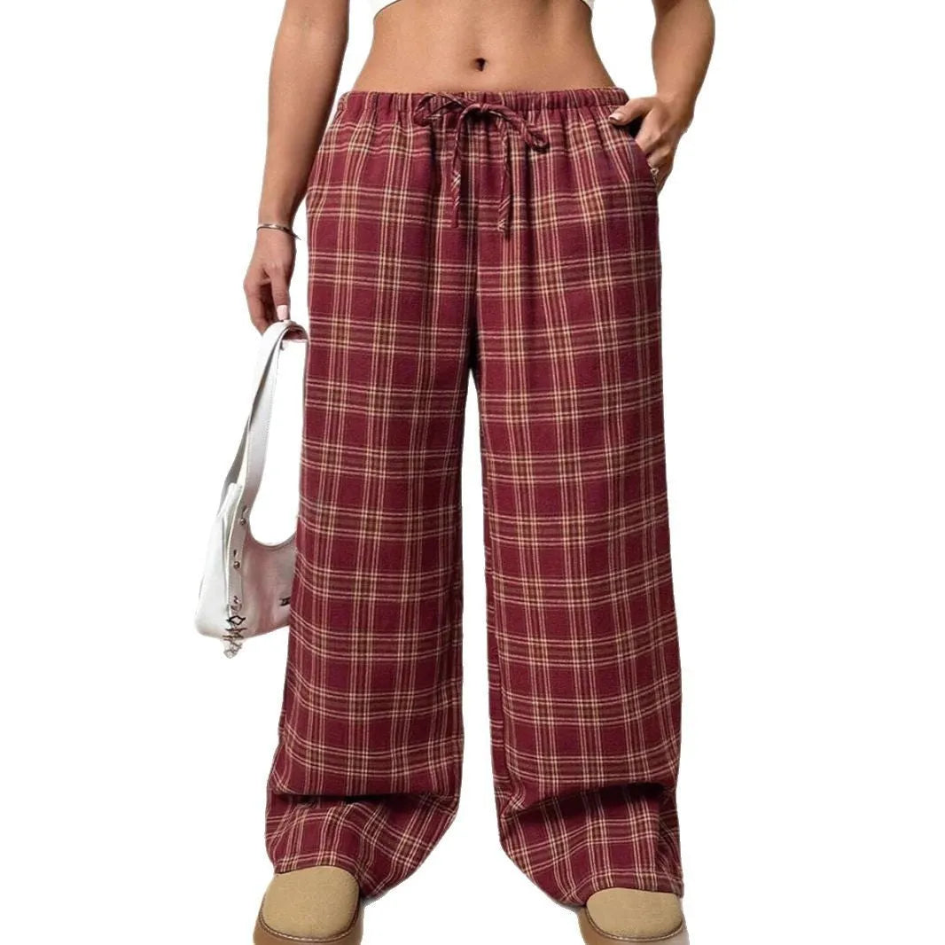Women's loose fit trousers with drawstring waist and plaid pattern pockets in blue colour