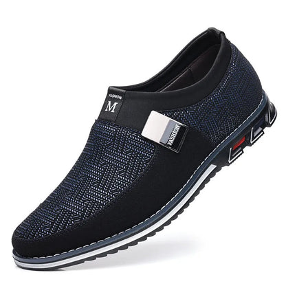 Men's grey and white synthetic leather slip-on casual shoes with a square toe and flat rubber sole.