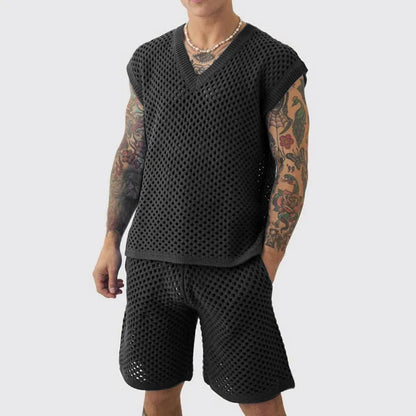 Men's blue V-neck sleeveless knitted vest and matching shorts sports suit on a hanger.