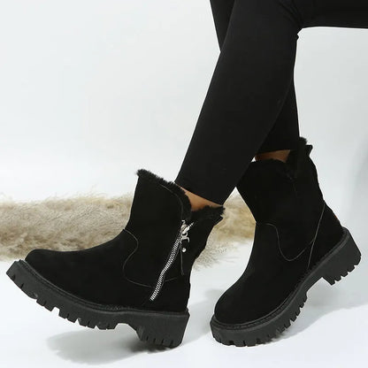 Women's black faux suede high-top snow boots with a side zipper and fur-lined collar.