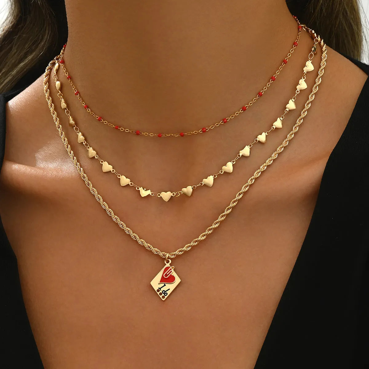 Three-layer geometric clavicle chain necklace with heart pendant on adjustable zinc alloy chain