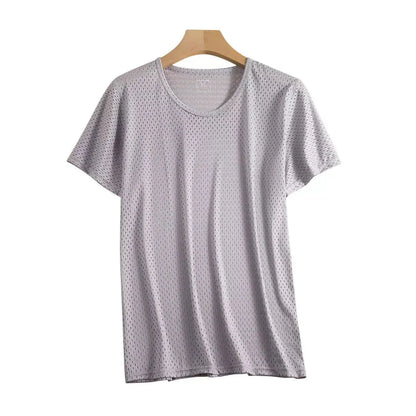 Man wearing a solid colour ice silk short sleeve t-shirt with a crew neck in a loose, casual fit for summer.