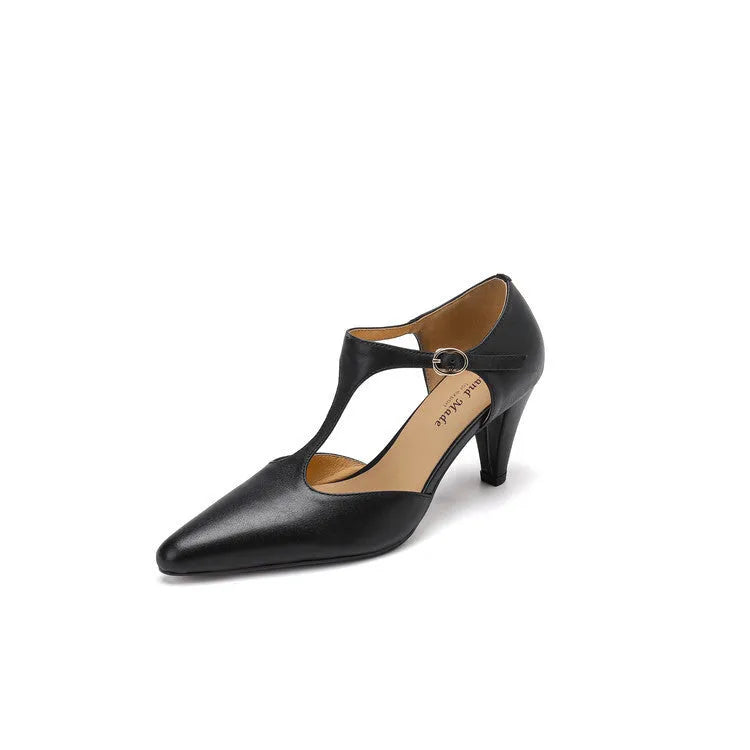 Brown retro women's T-strap sandals with a closed toe and a short stout block heel.