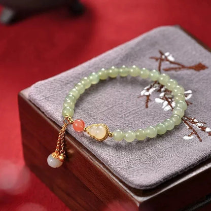 Qingshui jade women's bracelet with gold gourd charm and fu character, 6mm gold plated beads