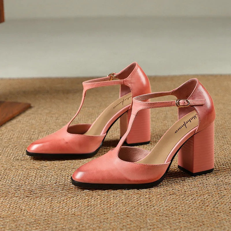 Baotou hollow retro women's Mary Jane shoes in pink with pointed toe and buckle.