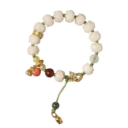 White jade Bodhi bracelet with lotus and pumpkin beads on open rope design