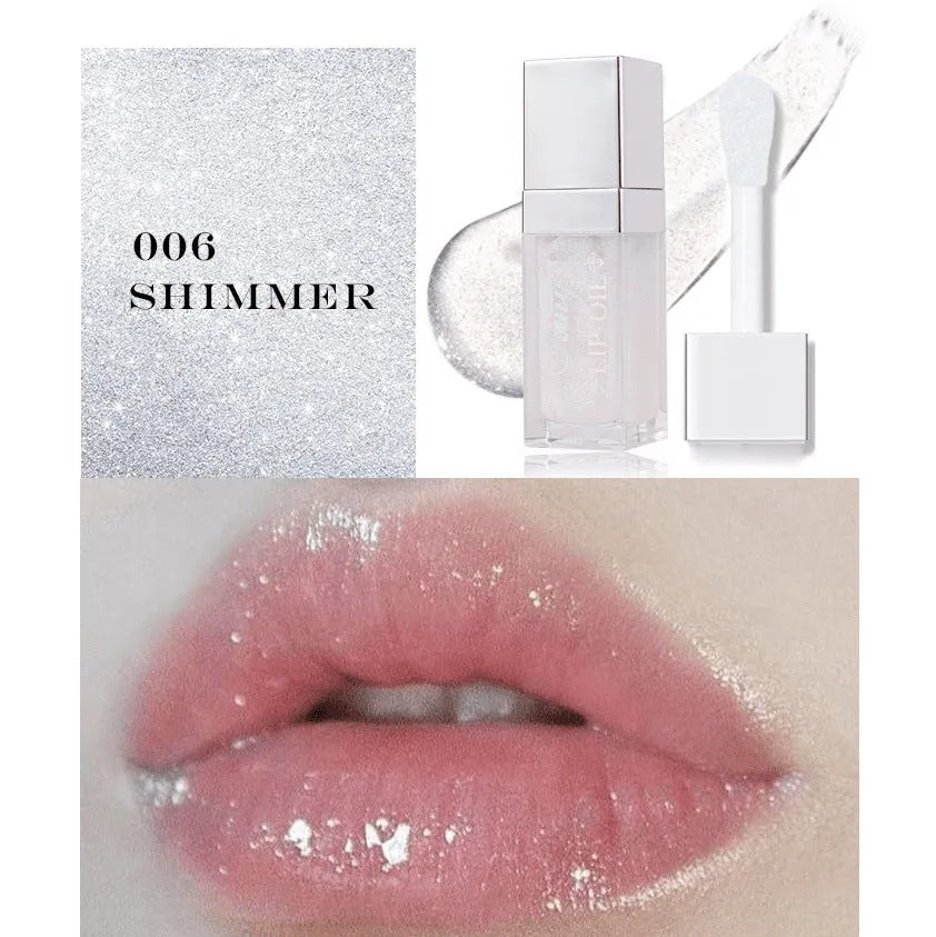 Set of five bright lip gloss tubes with lip essence oil applicators in shades Style001, 006, 007, 012, and 015.