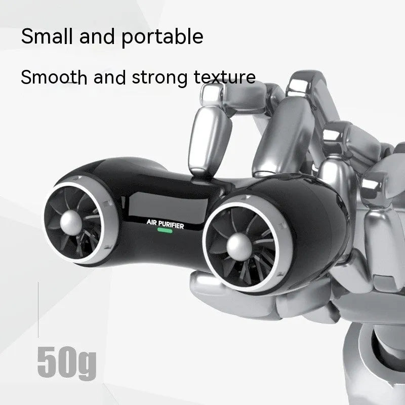 Compact black car anion air purifier with USB cable for formaldehyde removal and deodorising.