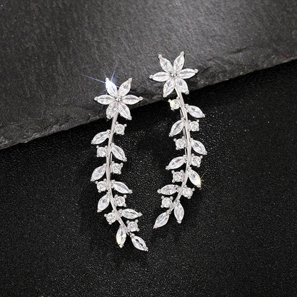 Exquisite diamond flower earrings for women in white gold, gold, and rose gold finishes