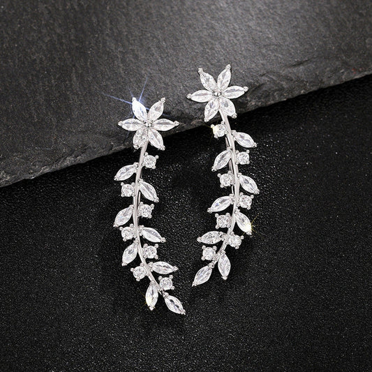 Exquisite diamond flower earrings for women in white gold, gold, and rose gold finishes