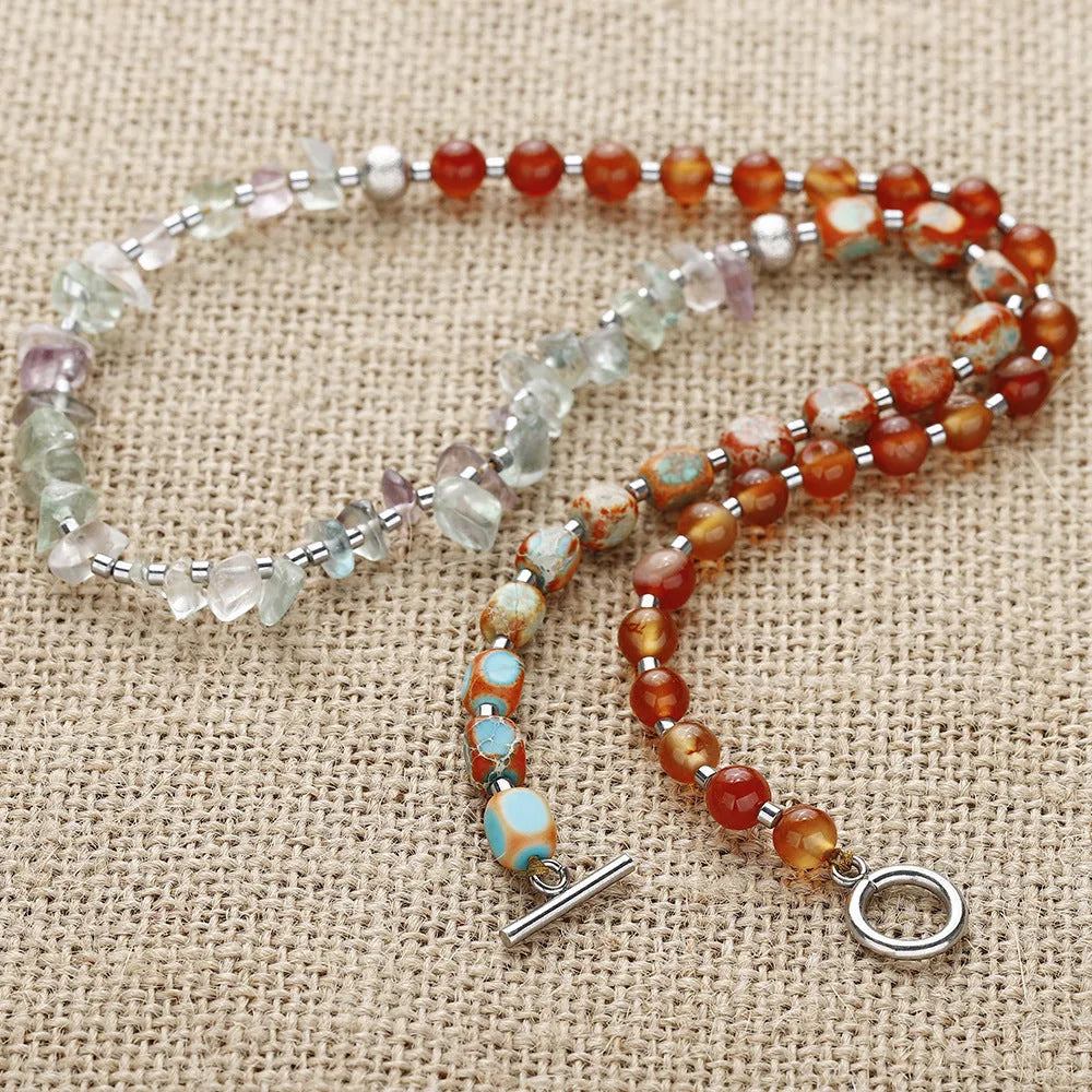 Hand-woven red agate round beads bracelet with geometric shapes and texture design