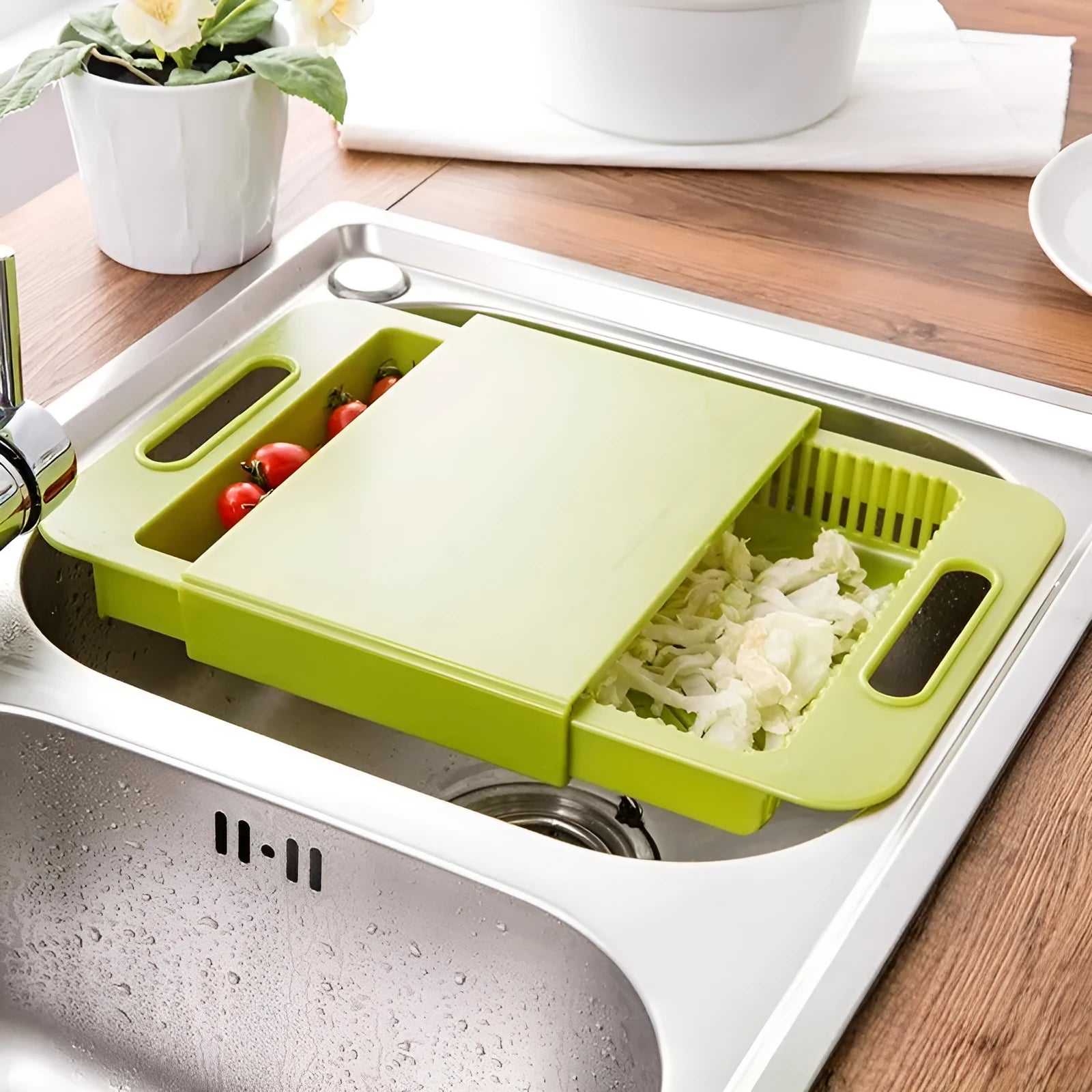 Blue multifunction kitchen chopping board with integrated sink drain basket and TPE handle.
