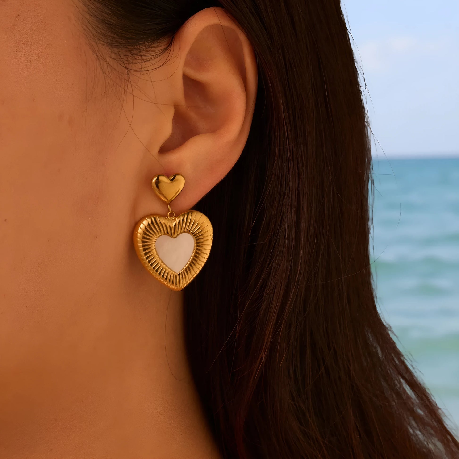 Women's gold heart fritillary earrings with stainless steel construction and 18K electroplating