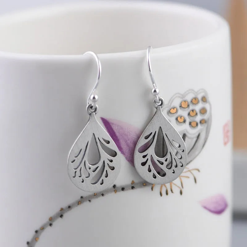 Women's retro hollow water drop silver earrings with small exquisite drop shape design