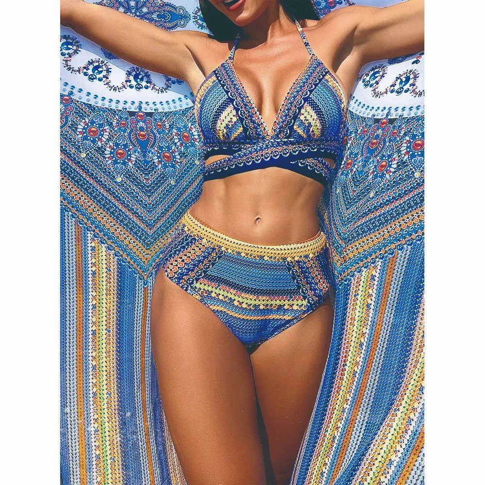Blue red cross-back bandage bikini top and high-waisted brief from a women's three-piece swimsuit set.