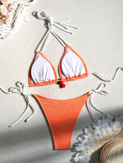 Women's sexy wind style bikini swimsuit in a solid colour, showing backless briefs design.