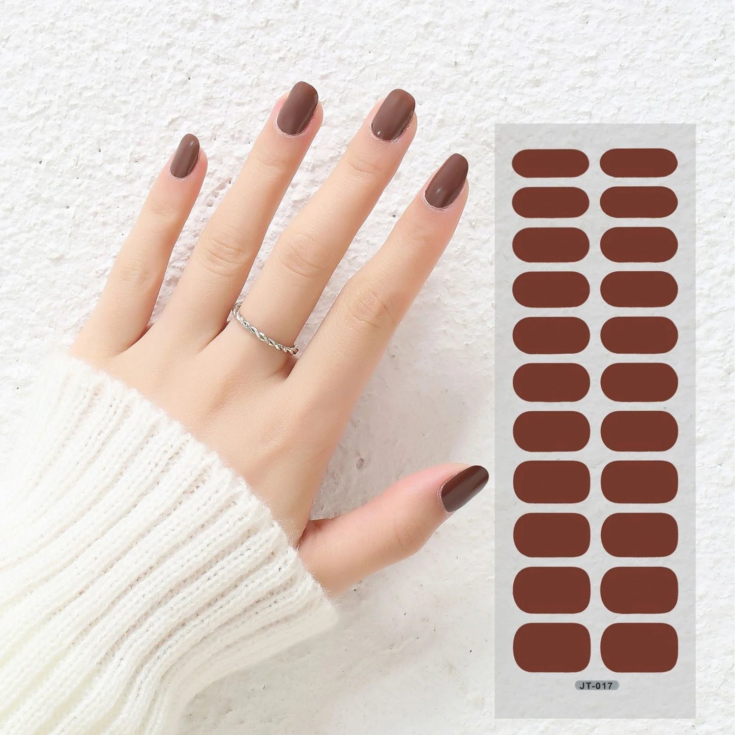 Semi-curing gel nail stickers sheet showing 22 solid colour designs including roses, tulips, and geometric patterns
