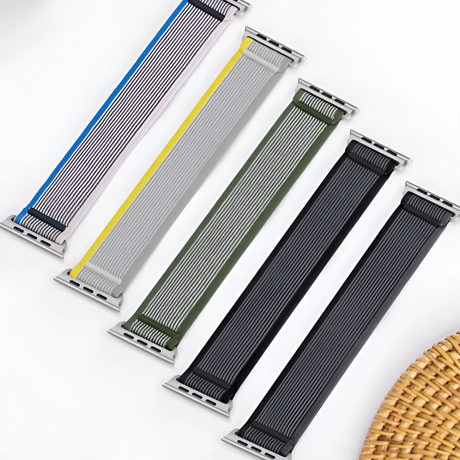 Nylon Apple Watch band with single ring strap closure in multiple colour options on a wrist