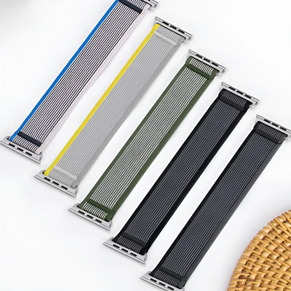 Nylon Apple Watch band with single ring strap closure in multiple colour options on a wrist