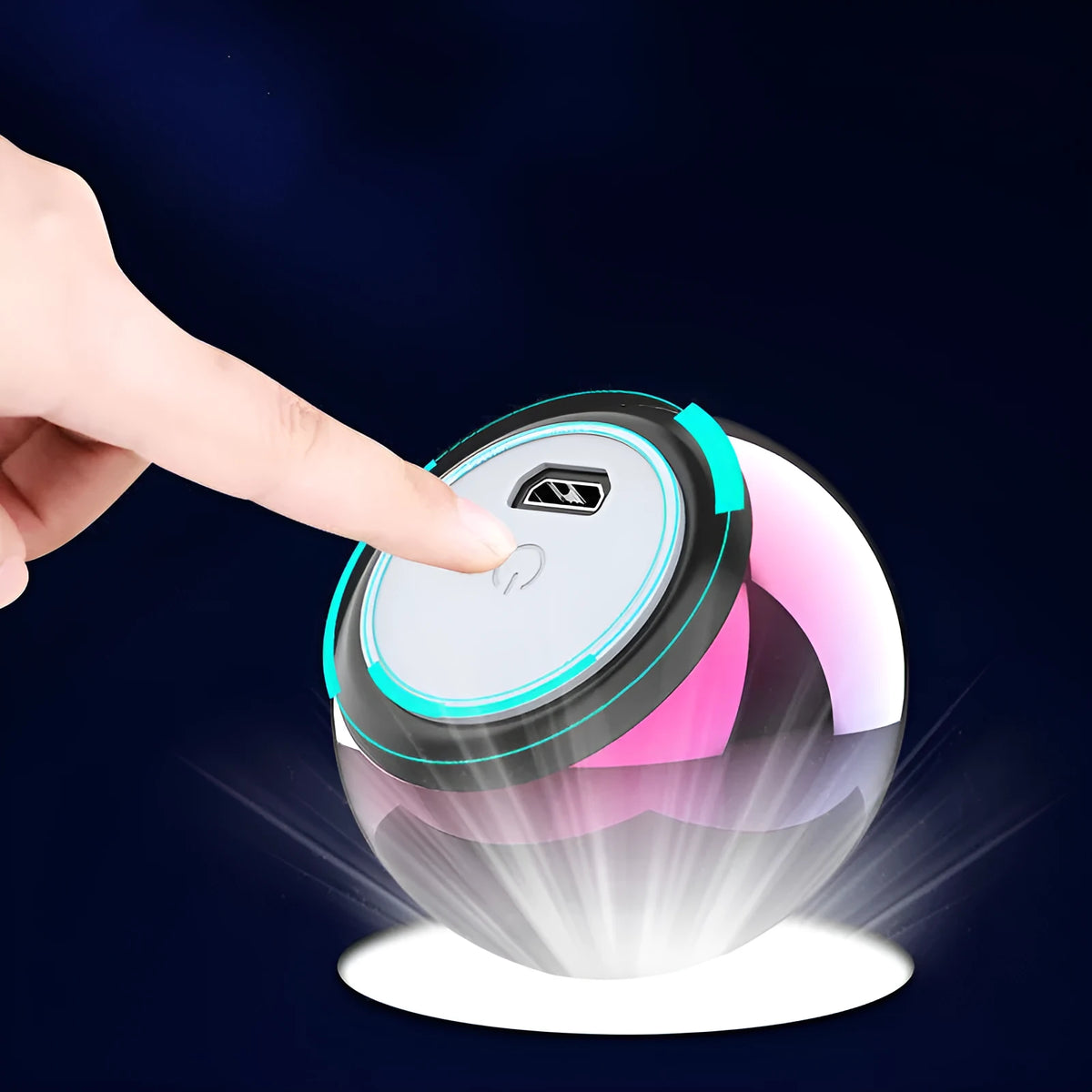 Small round aluminium Bluetooth speaker in gradient blue, showing compact size next to a USB cable.