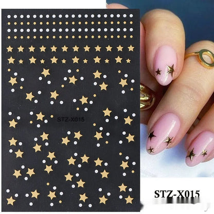 Assortment of black and silver nail sticker designs including cartoon and French tip patterns on a plastic sheet.