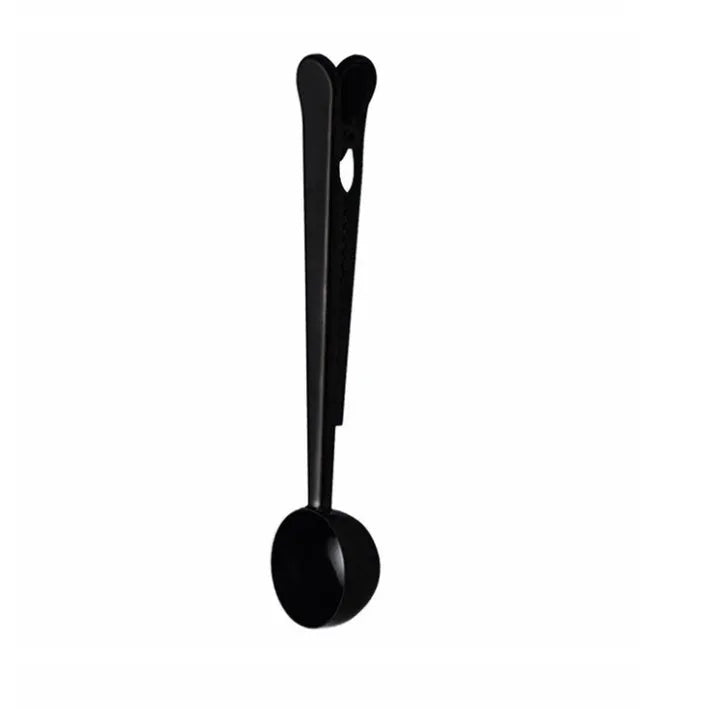 Silver stainless steel coffee scoop with integrated bag clip, measuring 17.5cm long