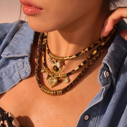 Stainless steel necklace with geometric leopard pendant on adjustable chain, 18K electroplated finish