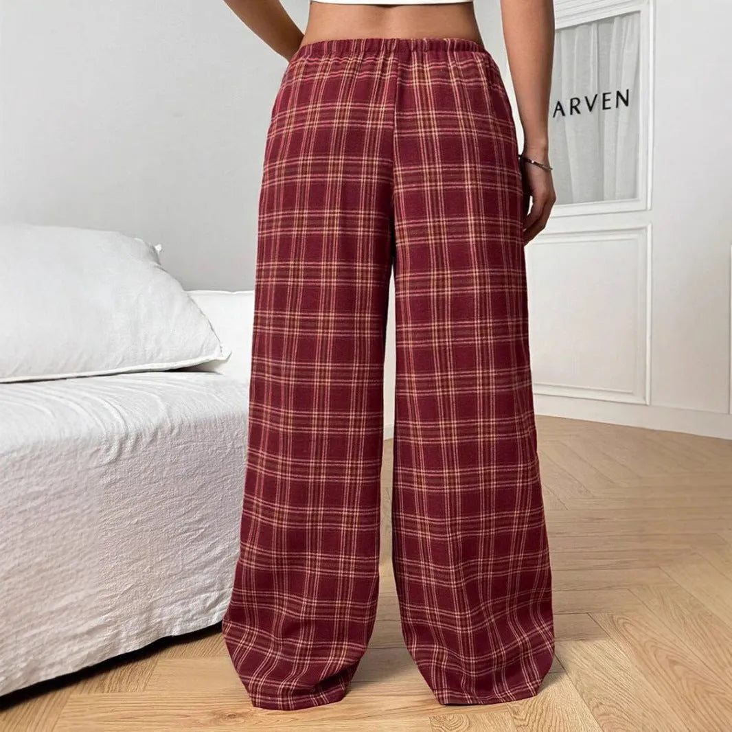 Women's loose fit trousers with drawstring waist and plaid pattern pockets in blue colour