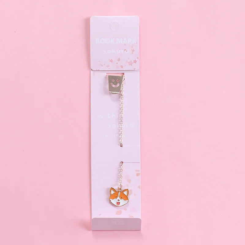 Alloy metal cartoon pendant bookmark with colourful charms including panda, rocket, and wishing bottle designs