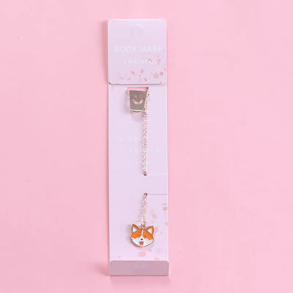 Alloy metal cartoon pendant bookmark with colourful charms including panda, rocket, and wishing bottle designs