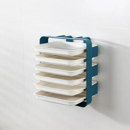 Wall-mounted kitchen shelf with stackable trays in navy blue, white, and coffee colour options