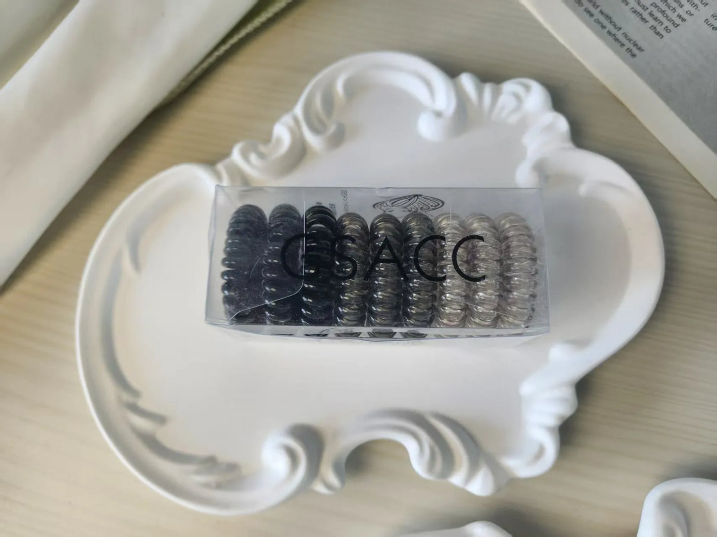 Set of 9 TPU traceless hairbands in various colours for phone cable organisation
