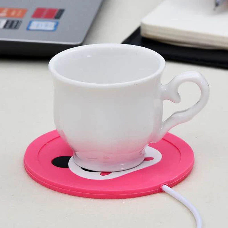 Cosy USB-powered heating pad with a soft rubber construction and a playful animal-inspired design, perfect for keeping mugs and cups warm