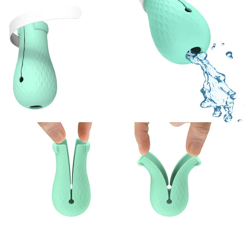 Four green silicone cat paw scratch protector foot covers for pet grooming and handling