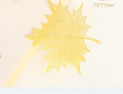 Brass metal bookmark with hollow plating leaf design and rose gold tassel decoration