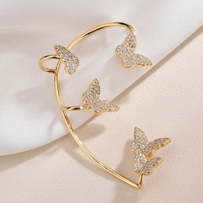 Elegant gold-plated butterfly ear cuffs with sparkling zircon accents, perfect for women's fashion and accessorizing