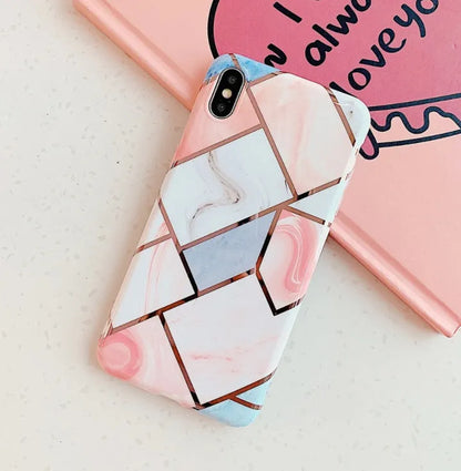 Clear silicone gel mobile phone case for iPhone models on a table