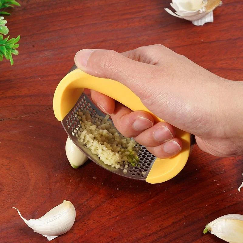 Stainless steel garlic press with non-slip handle for easy crushing