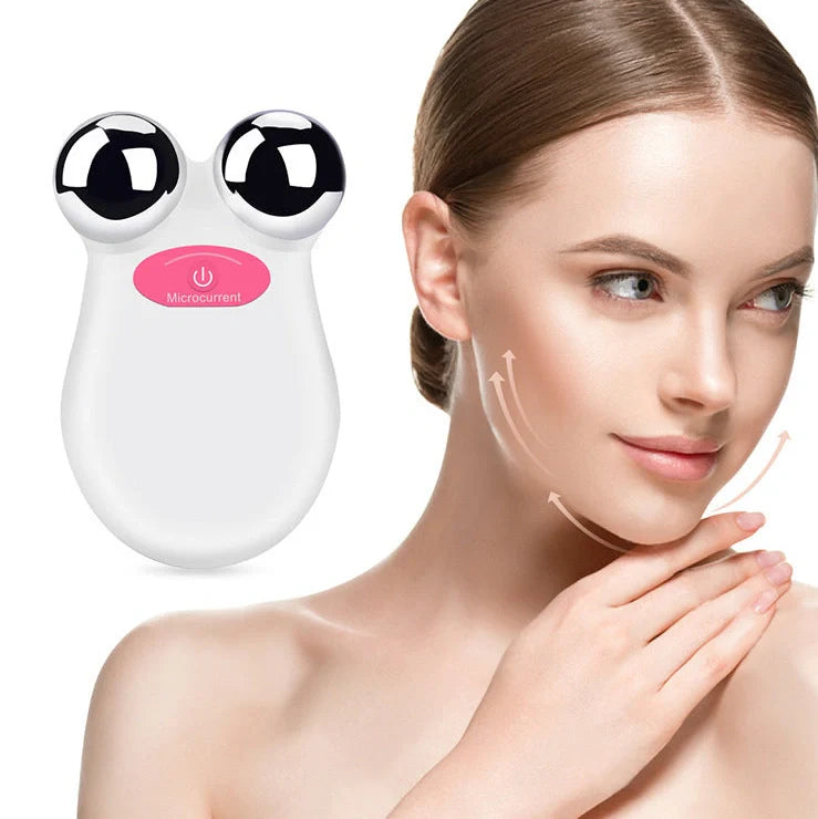 Micro current beauty instrument in orange and white colours showing facial treatment application