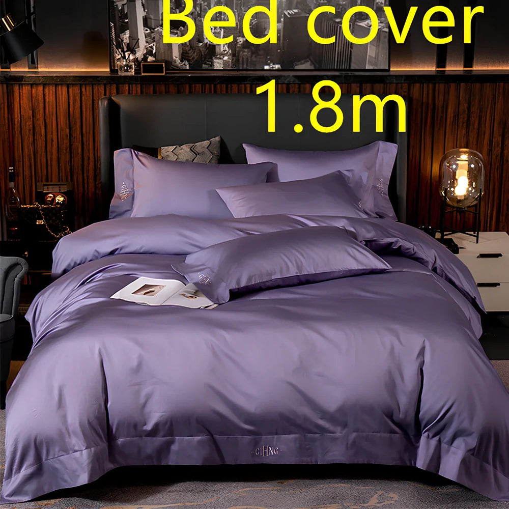 Four-piece cotton bedding set with satin weave fabric showing quilting detail and colour options